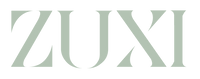 ZUXI "Pack With Purpose" wordmark logo in sage green on a transparent background.