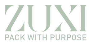 ZUXI "Pack With Purpose" wordmark logo in sage green on a transparent background.